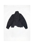 A black cropped jacket with a high collar and long sleeves, shown from the back on a white background.